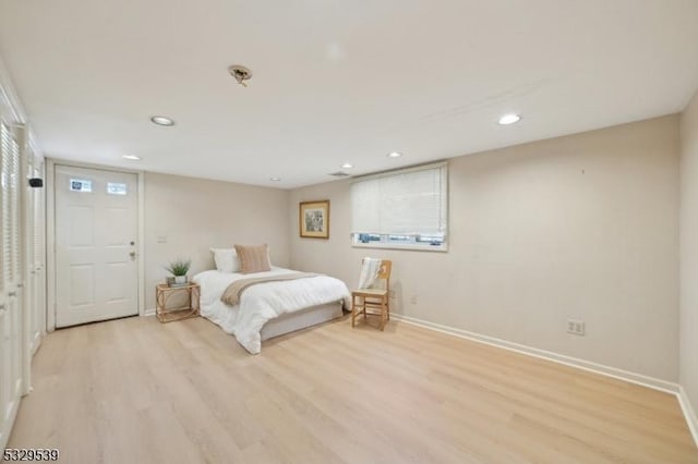 bedroom featuring light wood-type flooring