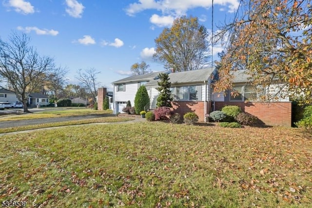 view of yard featuring a garage