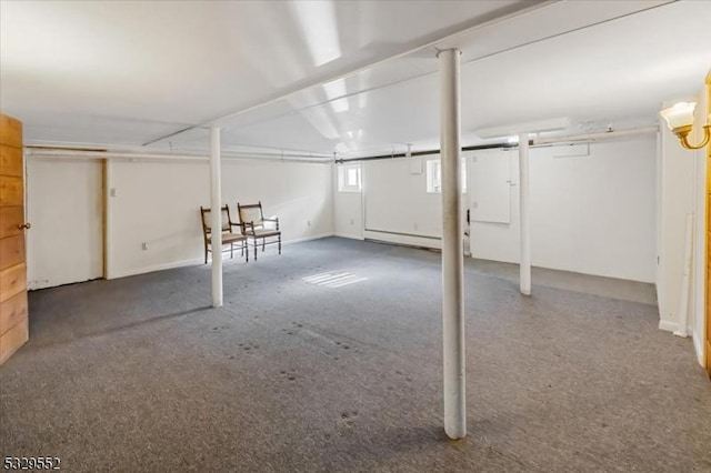 basement featuring a baseboard radiator