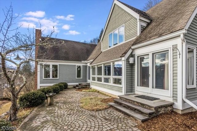 rear view of property with a patio area