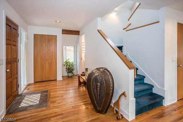 entryway with light hardwood / wood-style flooring