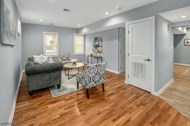 sitting room with light hardwood / wood-style floors