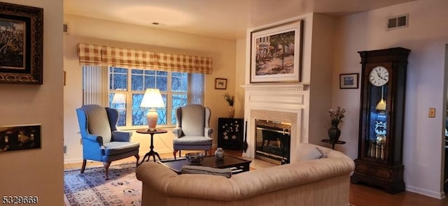 living area with wood-type flooring