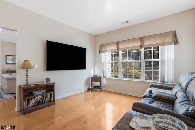 living room featuring light wood-type flooring