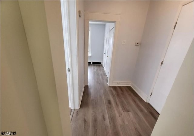 corridor featuring light hardwood / wood-style flooring