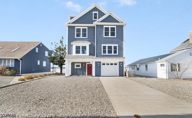 45 Paul Jones Dr, Brick Twp, NJ 08723 - view of front of home with a garage
