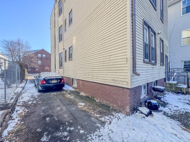 view of snow covered property