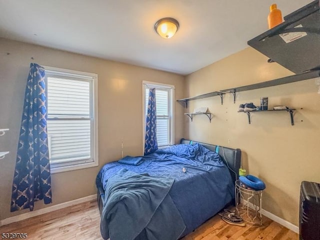 bedroom featuring hardwood / wood-style floors