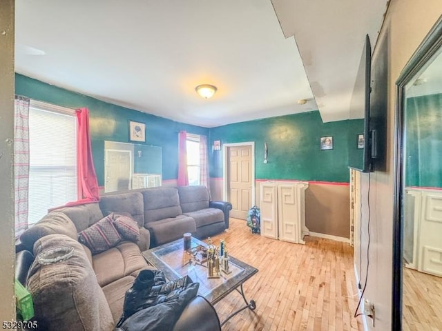 living room featuring light wood-type flooring