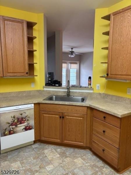 kitchen with ceiling fan, sink, and white dishwasher