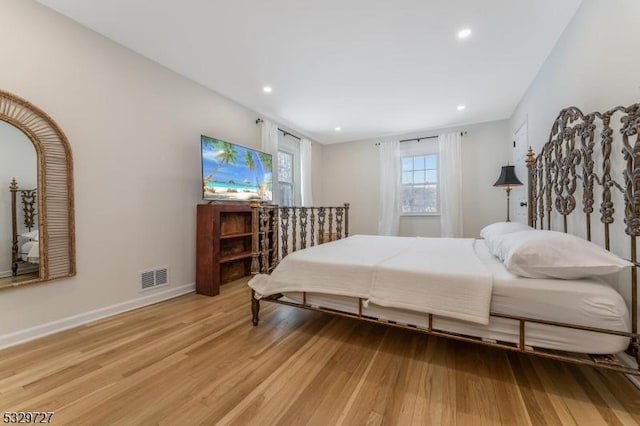 bedroom featuring light wood-type flooring