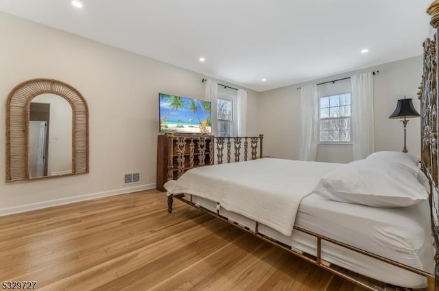 bedroom with light wood-type flooring