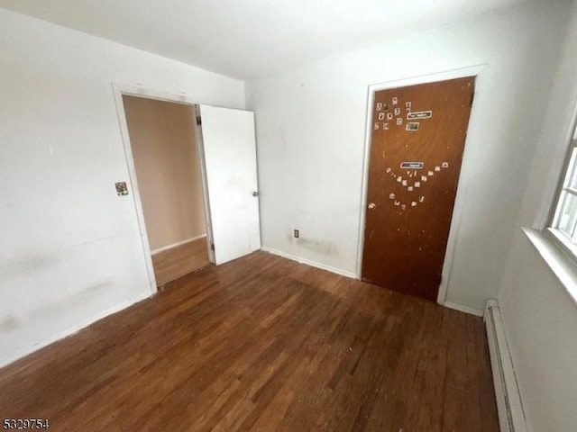 6 Van Buren Ave, Vernon Twp, NJ 07462 - spare room with wood finished floors and baseboard heating