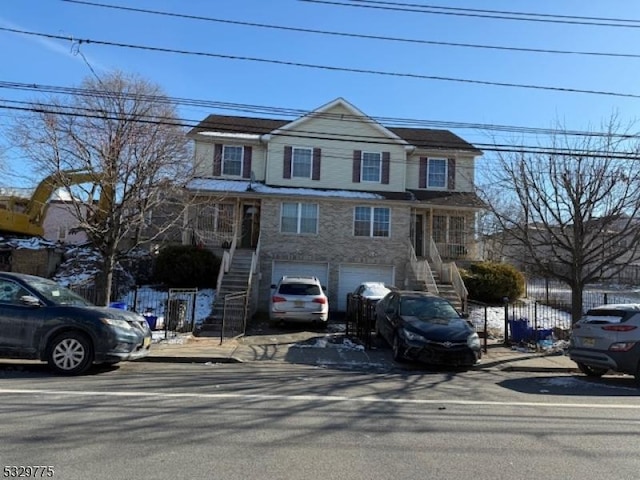 front of property with a garage