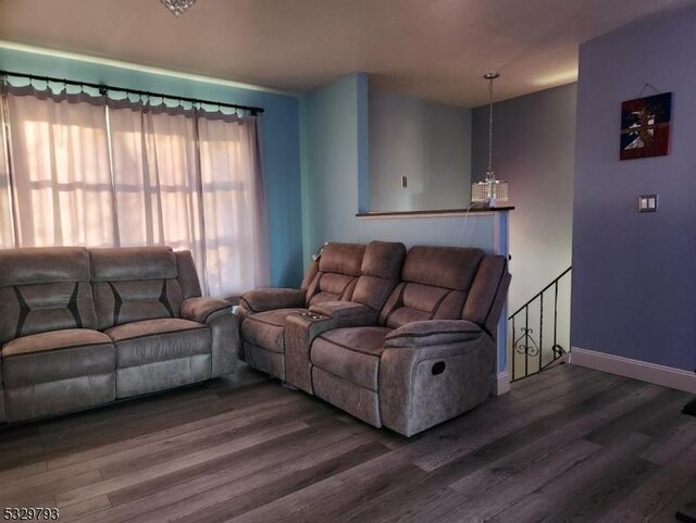 living room with dark hardwood / wood-style floors