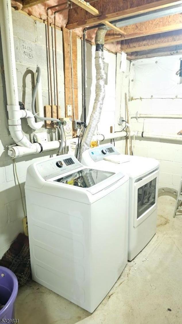 laundry room featuring washer and dryer