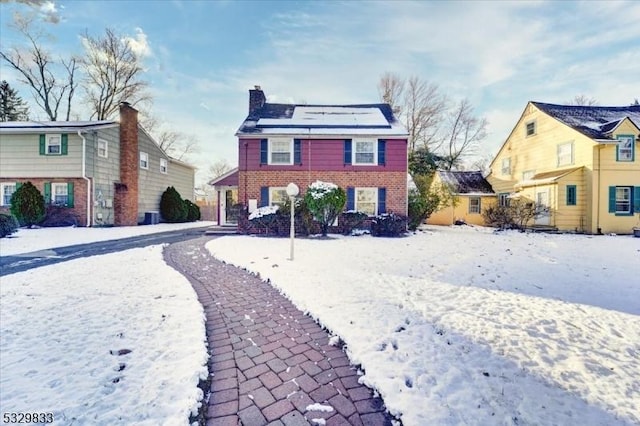 view of front of house with solar panels