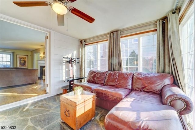 living room featuring ceiling fan