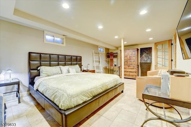 bedroom featuring light tile patterned floors