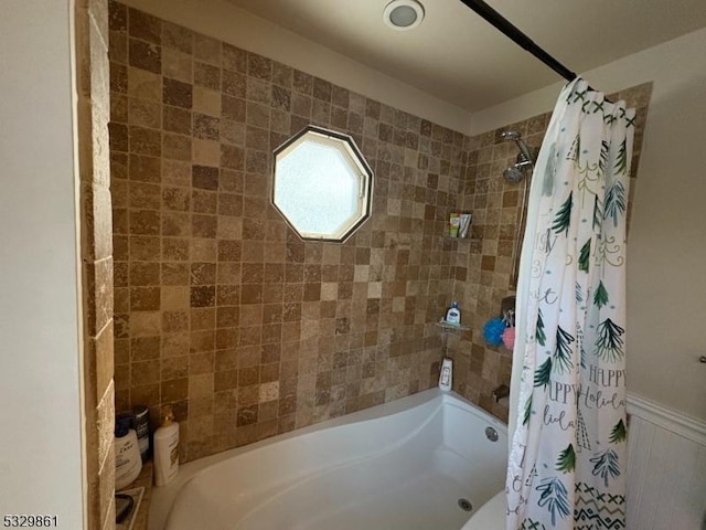 bathroom featuring shower / bath combo with shower curtain