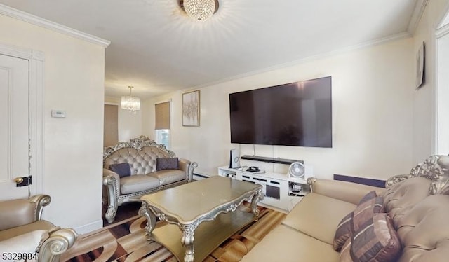 living room featuring an inviting chandelier and crown molding