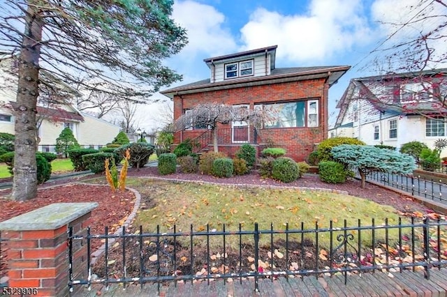 view of front of house with a front lawn