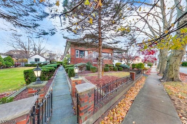 view of community featuring a lawn