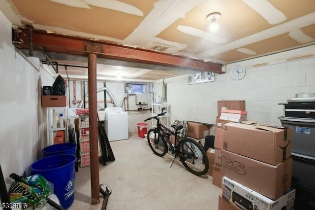 basement featuring washing machine and dryer