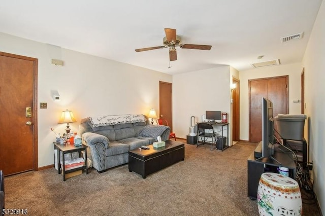 living room with ceiling fan and carpet floors