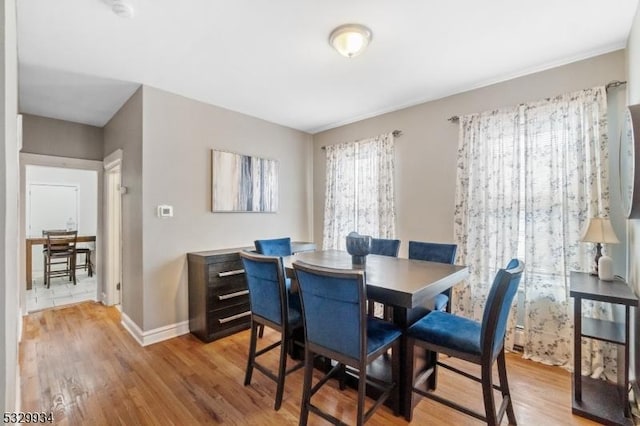 dining room with light hardwood / wood-style floors