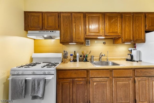 kitchen with gas range gas stove and sink