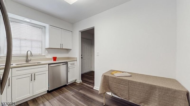 kitchen featuring white cabinets, stainless steel appliances, dark hardwood / wood-style floors, and sink