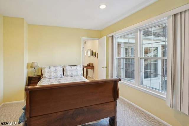 carpeted bedroom with recessed lighting and baseboards