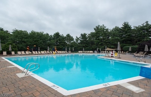 pool featuring a patio area