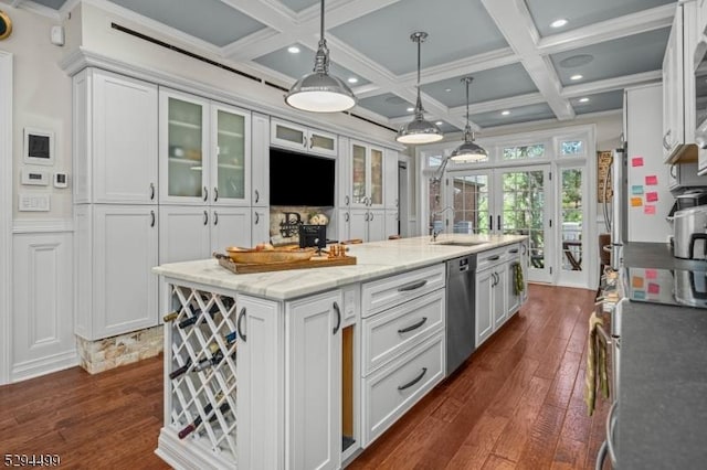 kitchen with french doors, sink, stainless steel dishwasher, an island with sink, and white cabinetry