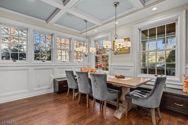 dining space with beamed ceiling, dark hardwood / wood-style floors, coffered ceiling, and a notable chandelier