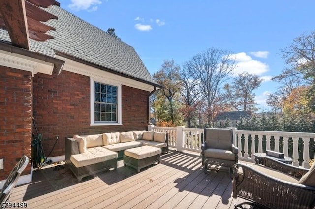 wooden deck featuring an outdoor living space