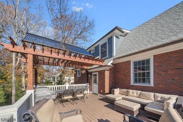 wooden terrace featuring outdoor lounge area and a pergola