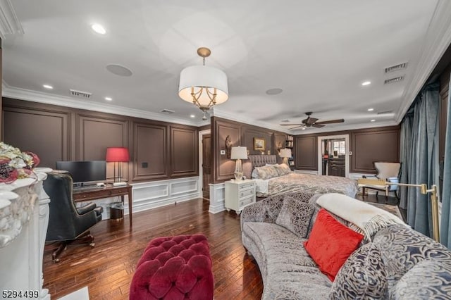 living room with ceiling fan, dark hardwood / wood-style flooring, and ornamental molding