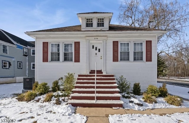 view of front of home featuring central air condition unit