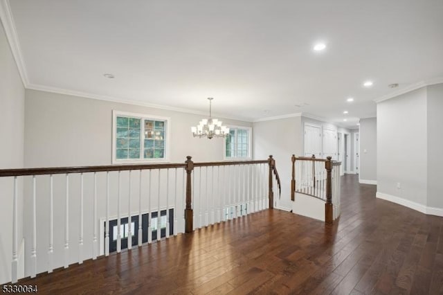 unfurnished room featuring baseboards, recessed lighting, wood-type flooring, and crown molding