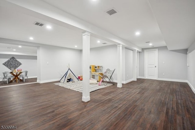 finished below grade area featuring baseboards, visible vents, wood finished floors, and recessed lighting