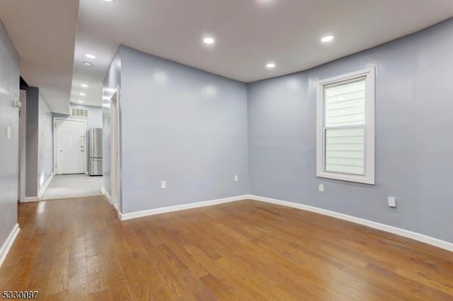 empty room featuring light hardwood / wood-style flooring