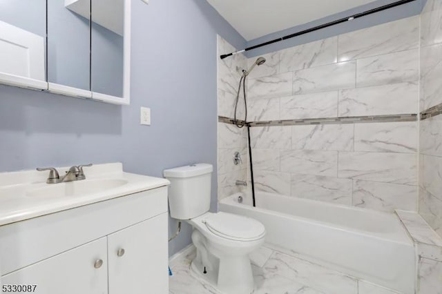 full bathroom featuring vanity, toilet, and tiled shower / bath