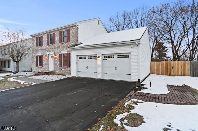 view of front of property featuring a garage