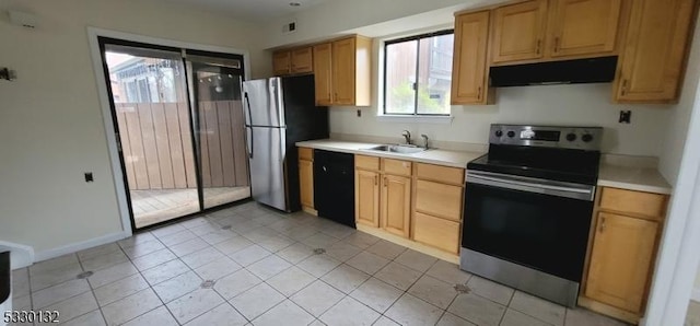 kitchen with sink and appliances with stainless steel finishes