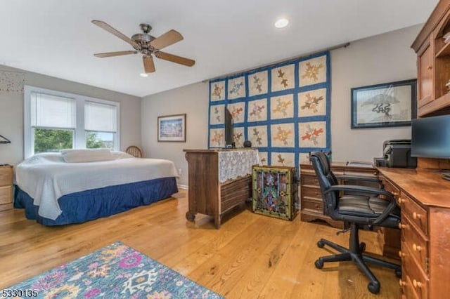 bedroom featuring ceiling fan and light hardwood / wood-style floors