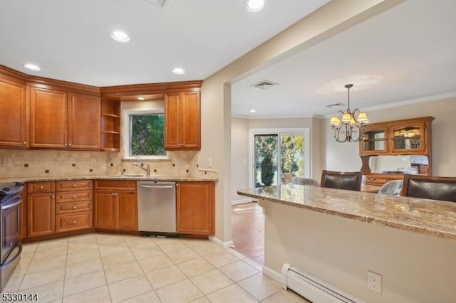 kitchen featuring light stone countertops, a baseboard heating unit, pendant lighting, a chandelier, and appliances with stainless steel finishes