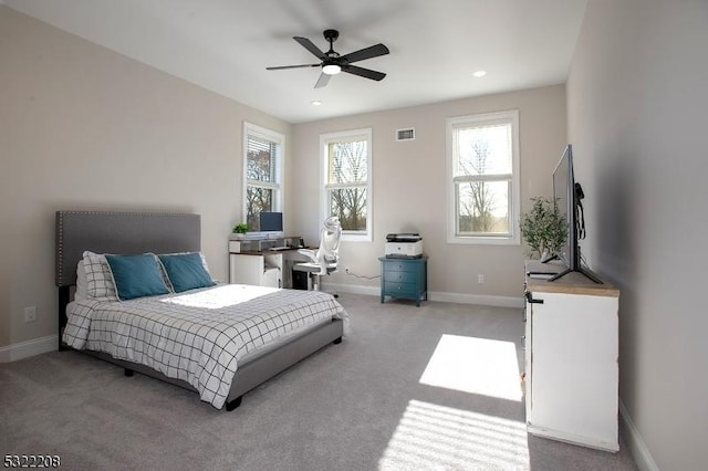 bedroom featuring ceiling fan and light colored carpet