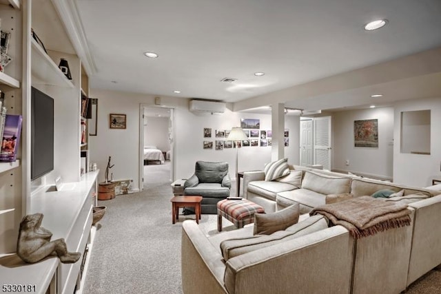 home theater featuring a wall mounted air conditioner and light carpet